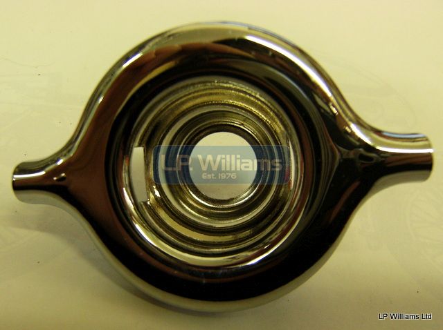 Tank trim retainer